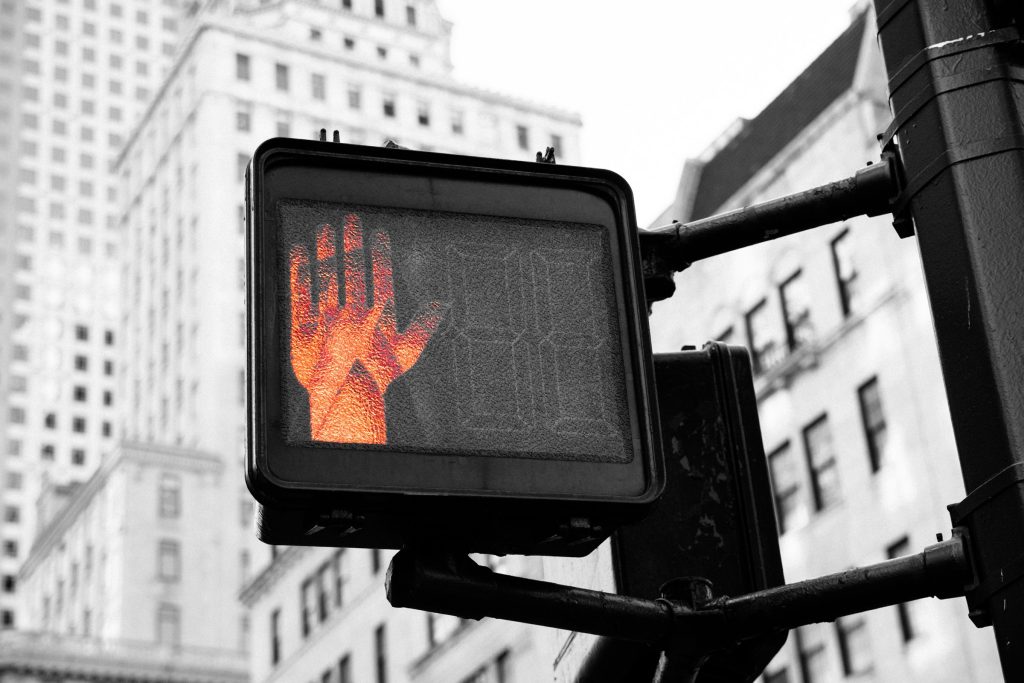 Photo of a halt sign as OpenAI pulls its new GPT-4o image generator from the free tier of ChatGPT after one day amid wider copyright and ethical debates around the use of AI to imitate human creativity.